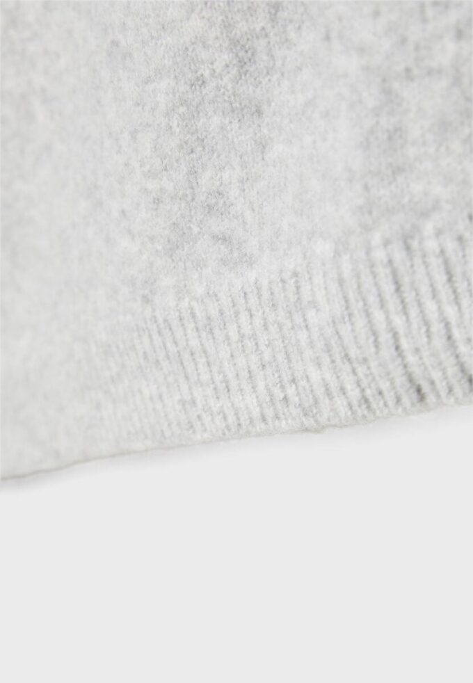 Asymetrický pletený svetr Asymetrický pletený svetr