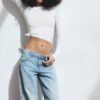 Džíny s nízkým pasem a Wide Leg nohavicemi s hvězdicovým detailem Džíny s nízkým pasem a Wide Leg nohavicemi s hvězdicovým detailem