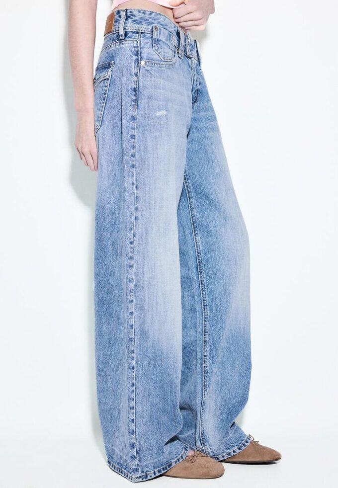 Džíny s nízkým pasem a Wide Leg nohavicemi s ozdobným knoflíkem Džíny s nízkým pasem a Wide Leg nohavicemi s ozdobným knoflíkem
