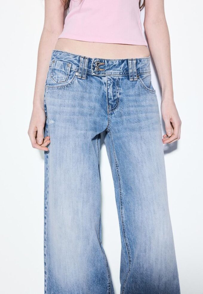 Džíny s nízkým pasem a Wide Leg nohavicemi s ozdobným knoflíkem Džíny s nízkým pasem a Wide Leg nohavicemi s ozdobným knoflíkem