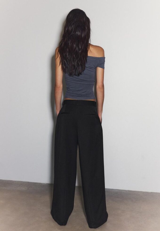 Elegantní kalhoty s výstřihem