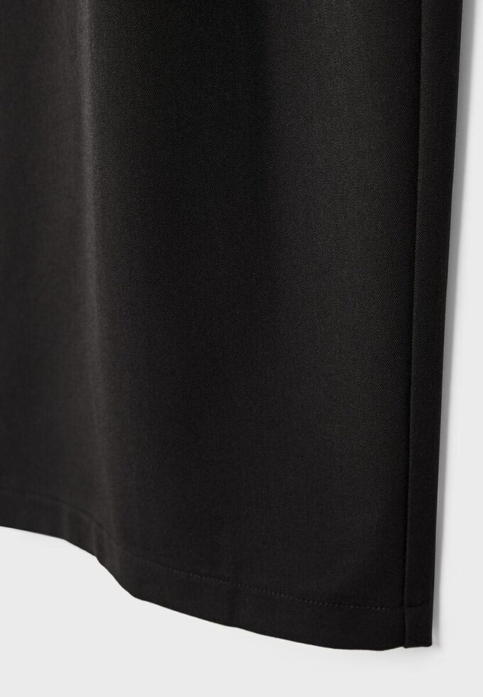 Elegantní kalhoty s výstřihem