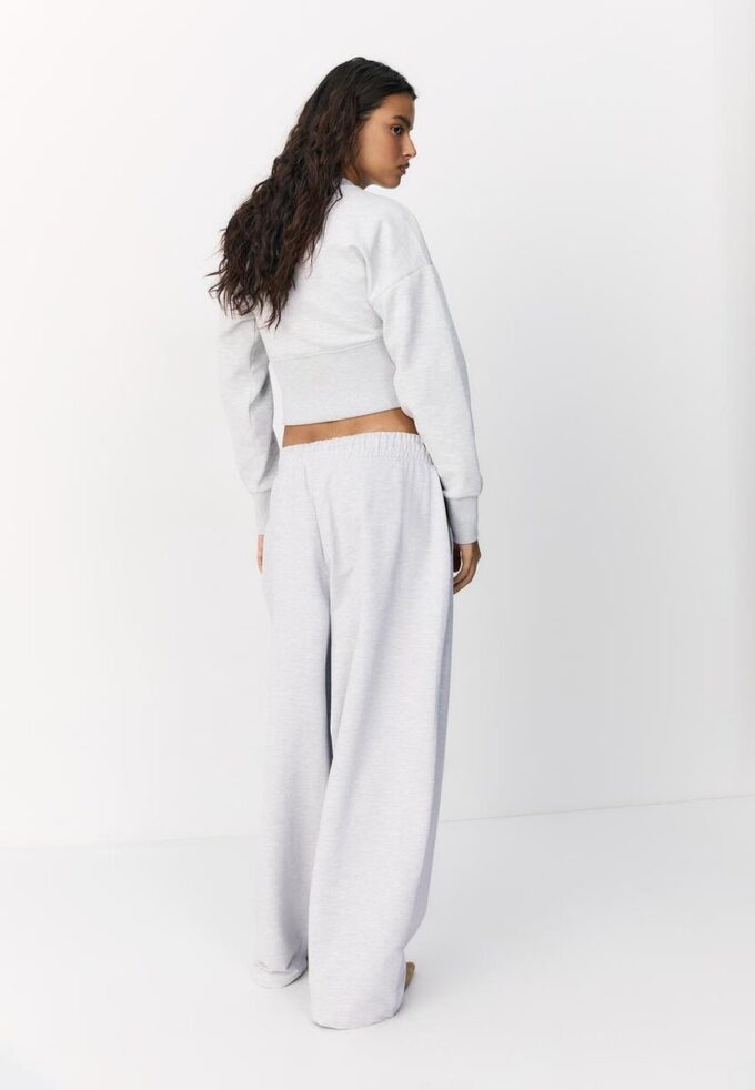 Joggingové kalhoty s balonovými nohavicemi a záševky