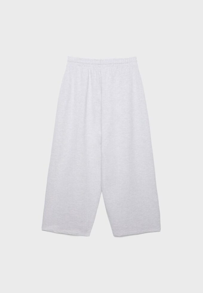 Joggingové kalhoty s balonovými nohavicemi a záševky