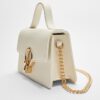 Kabelka přes rameno s kulatou sponou Kabelka přes rameno s kulatou sponou