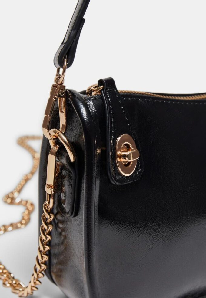 Kabelka přes rameno s více polohami