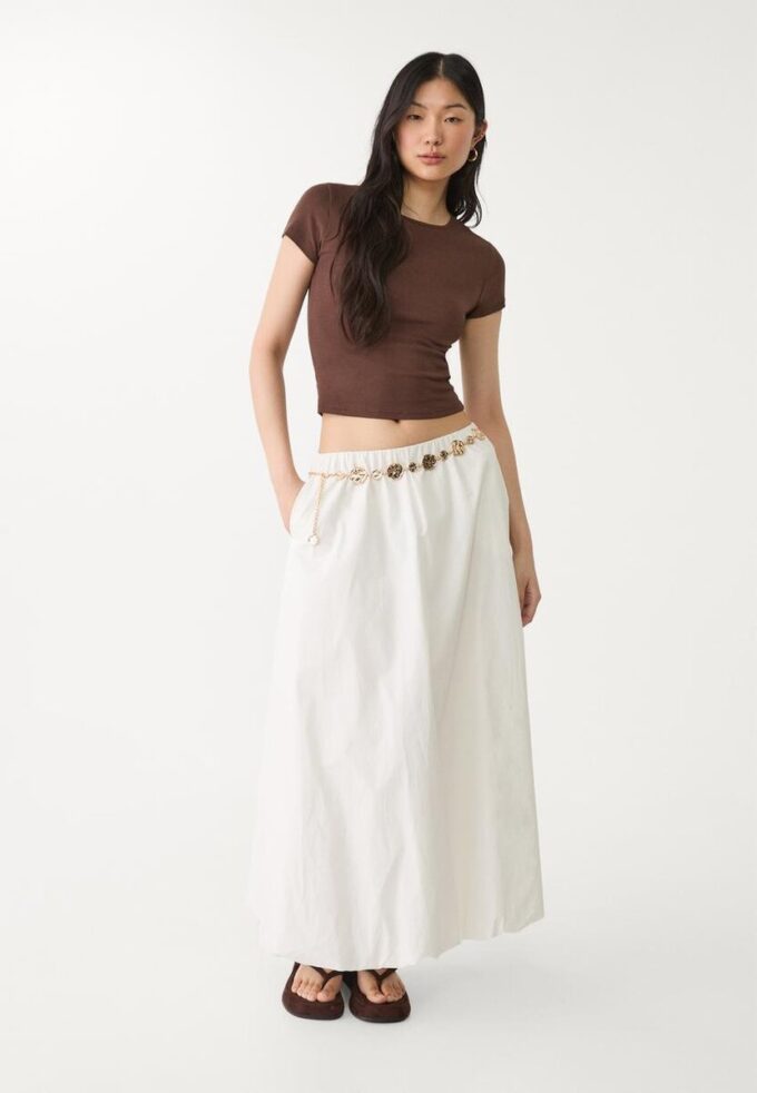 Kovový pásek s kulatými destičkami