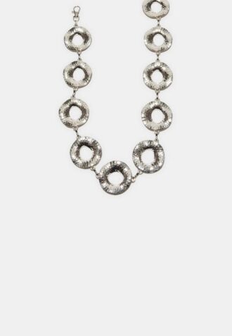 Kovový pásek s kulatými destičkami