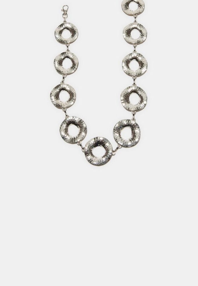 Kovový pásek s kulatými destičkami