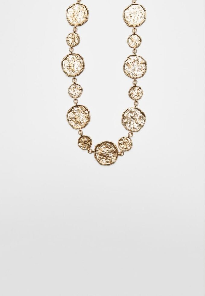 Kovový pásek s kulatými destičkami