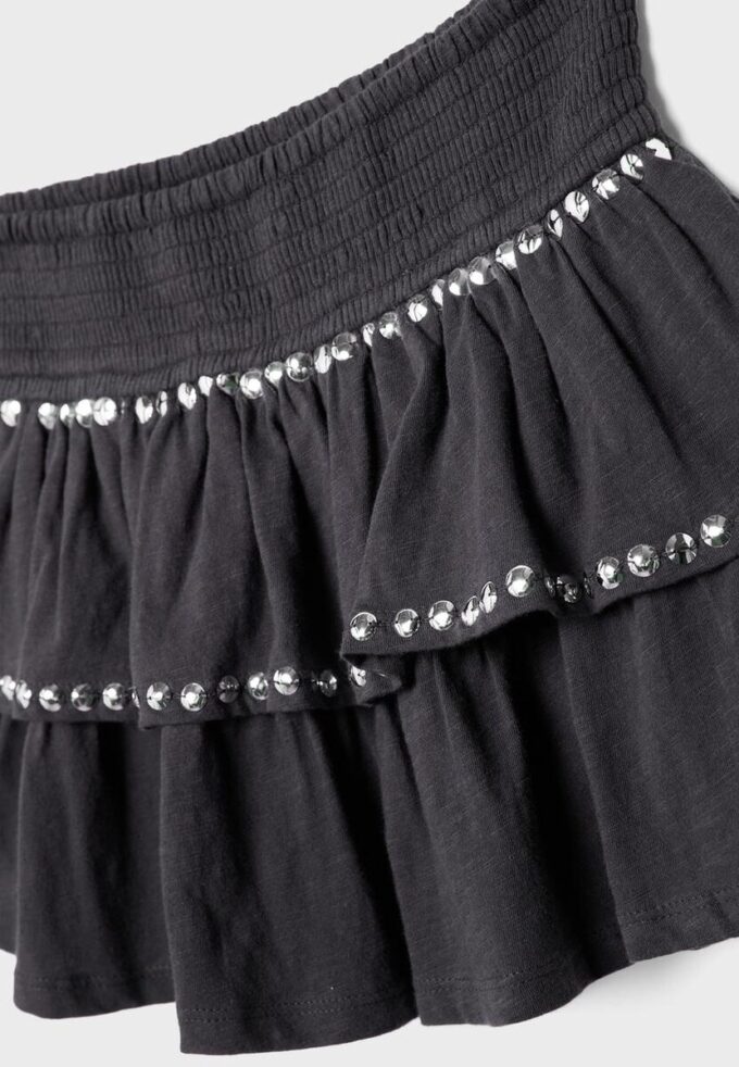 Mini sukně s volánky a cvočky