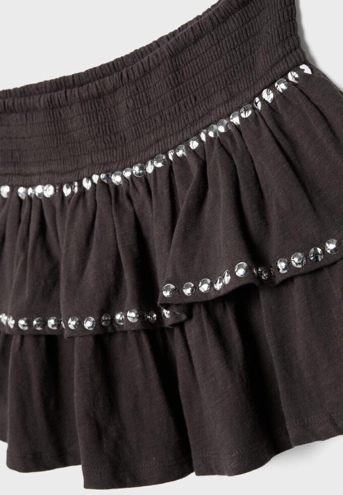 Mini sukně s volánky a cvočky