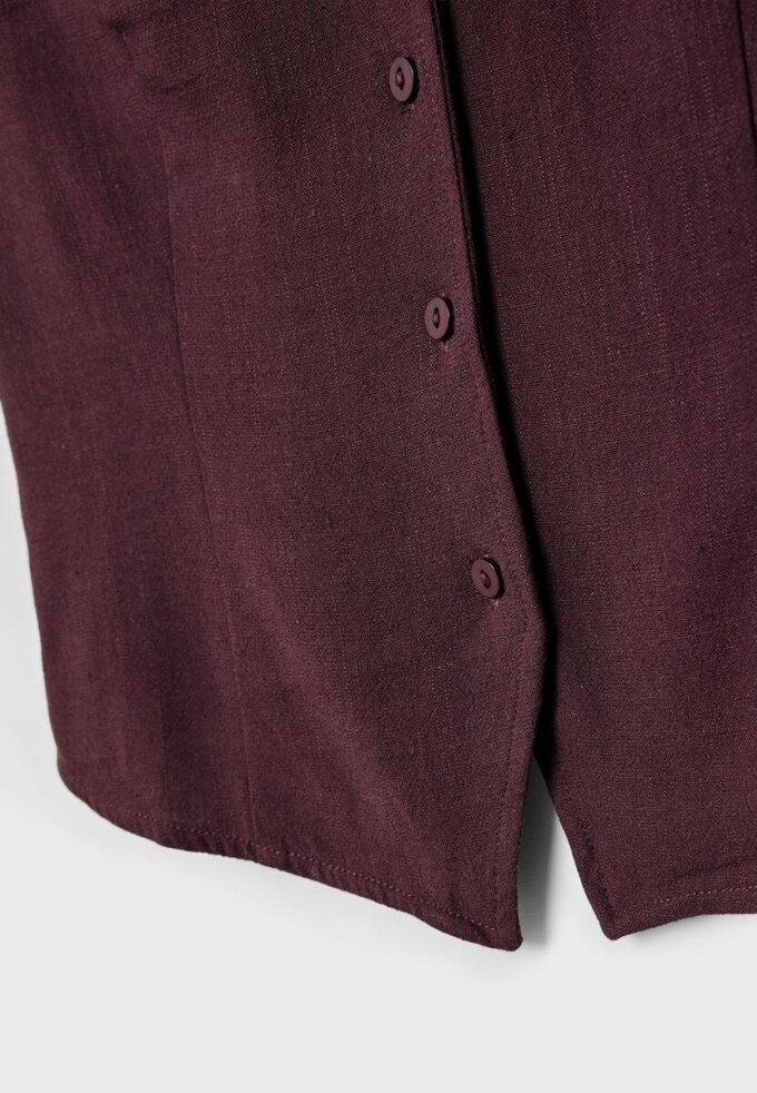 Top bez rukávů s knoflíky