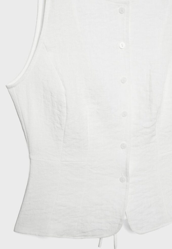 Vesta na knoflíky