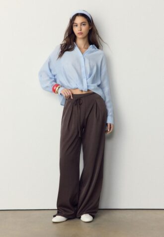 Volné kalhoty s efektem zmačkání a vázáním